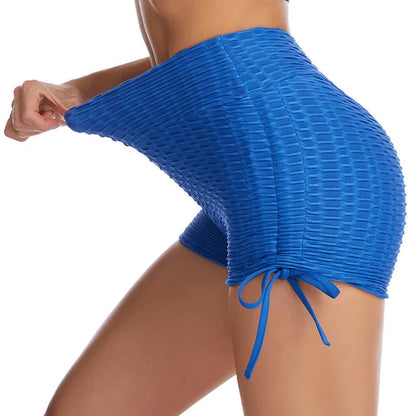 Stylish butt-lifting workout shorts with drawstring, available in various colors including pink, red, grey, navy, and black