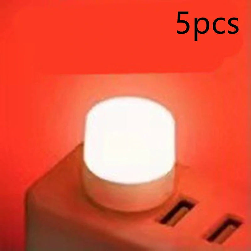 Compact USB LED night light with soft glow for reading and sleep