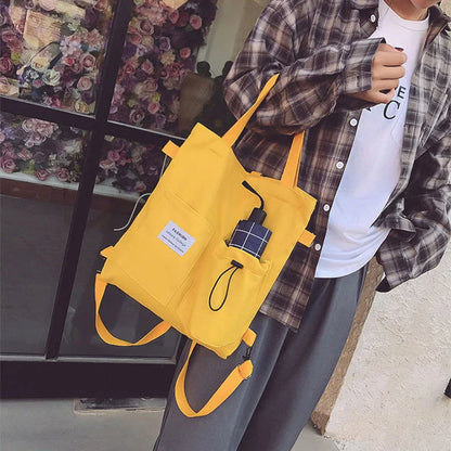 Stylish Harajuku-inspired canvas backpack with zipper closure, adjustable straps, and vibrant color options for students and women
