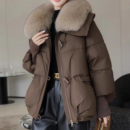Premium down-filled puffer jacket with faux fur collar, available in brown, black, and white colours