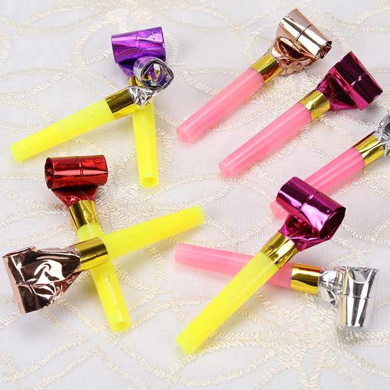 Colourful dragon-themed party favours made of high-quality plastic, including sticks and hammers in a variety of vibrant hues