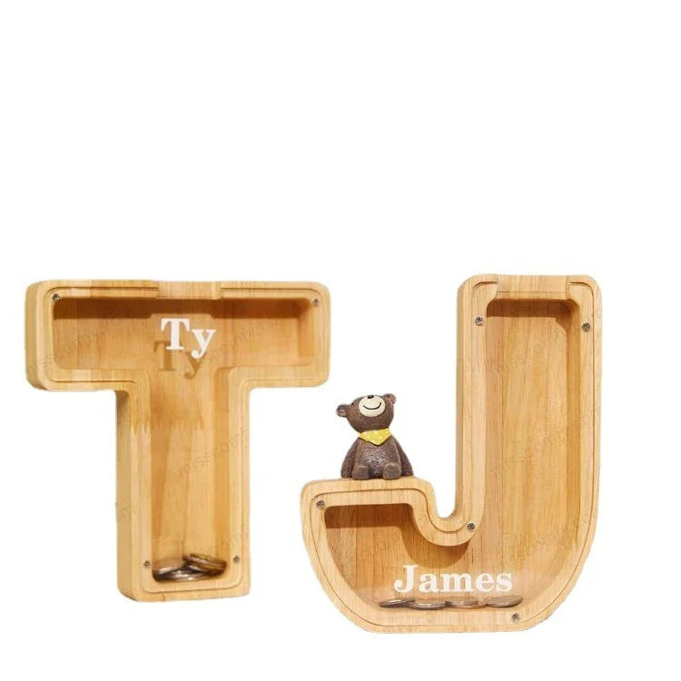 Personalized letter-shaped wooden money bank with clear viewing window for tracking savings progress