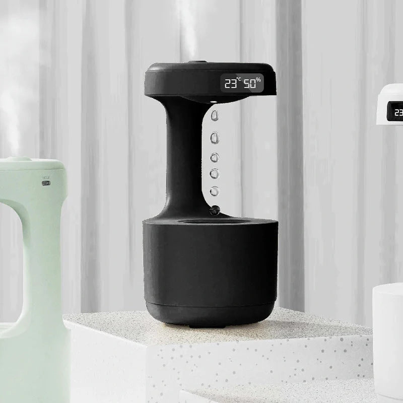 Anti-gravity humidifier with LED display and aroma diffuser in white, green, and black