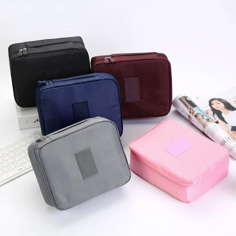 Premium toiletry bag with waterproof divider, multi-grid pockets, and durable Oxford cloth construction