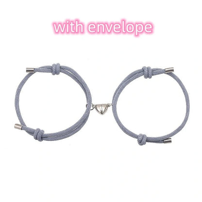 Adjustable nylon love magnetic bracelet with sticky metal heads in various colours