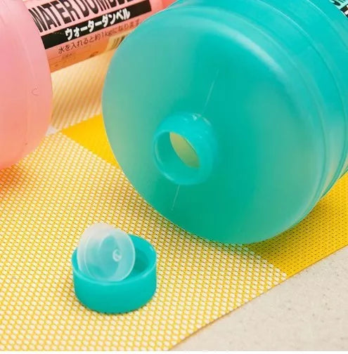 Water-filled fitness dumbbells for women in pink and green, adjustable weight