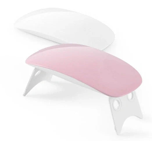 Compact and portable USB-powered nail light therapy machine with adjustable angle and LED light for at-home nail care
