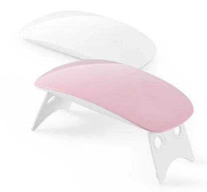 Compact and portable USB-powered nail light therapy machine with adjustable angle and LED light for at-home nail care