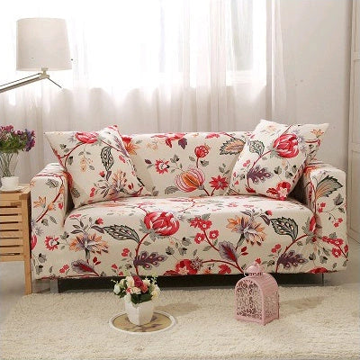 Stretchable geometric print sofa cover on a three-seater sofa