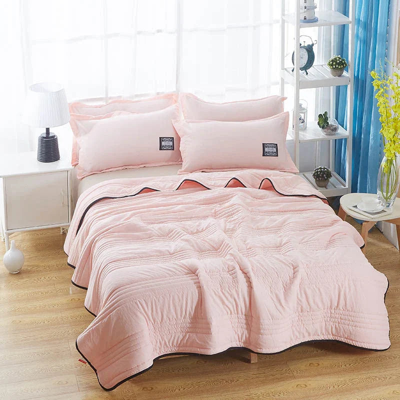 Premium cooling quilts in various colors and sizes for comfortable, temperature-regulating sleep