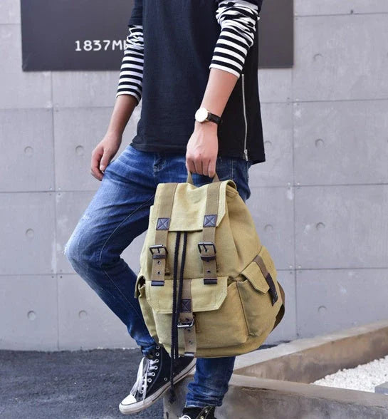 Premium canvas backpack with spacious compartments, comfortable padded straps, and a versatile, stylish design for urban adventures.