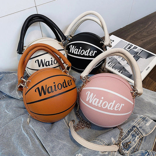 Basketball-shaped handbag in pink, white, black, or brown with adjustable chain shoulder strap