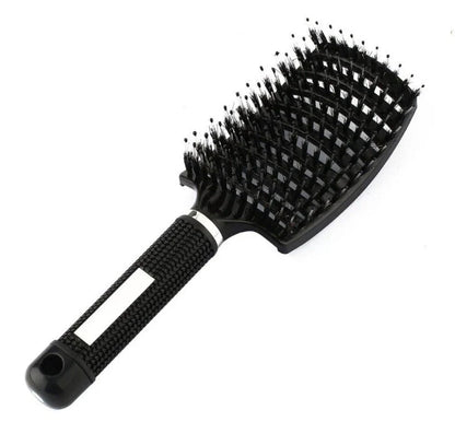 A premium hair brush with a sleek design, featuring soft bristles and a rounded massage function for healthy, detangled hair