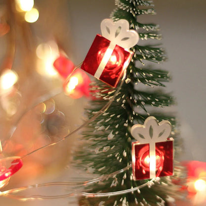 Festive LED string lights with Christmas-themed ornaments for home and party decor