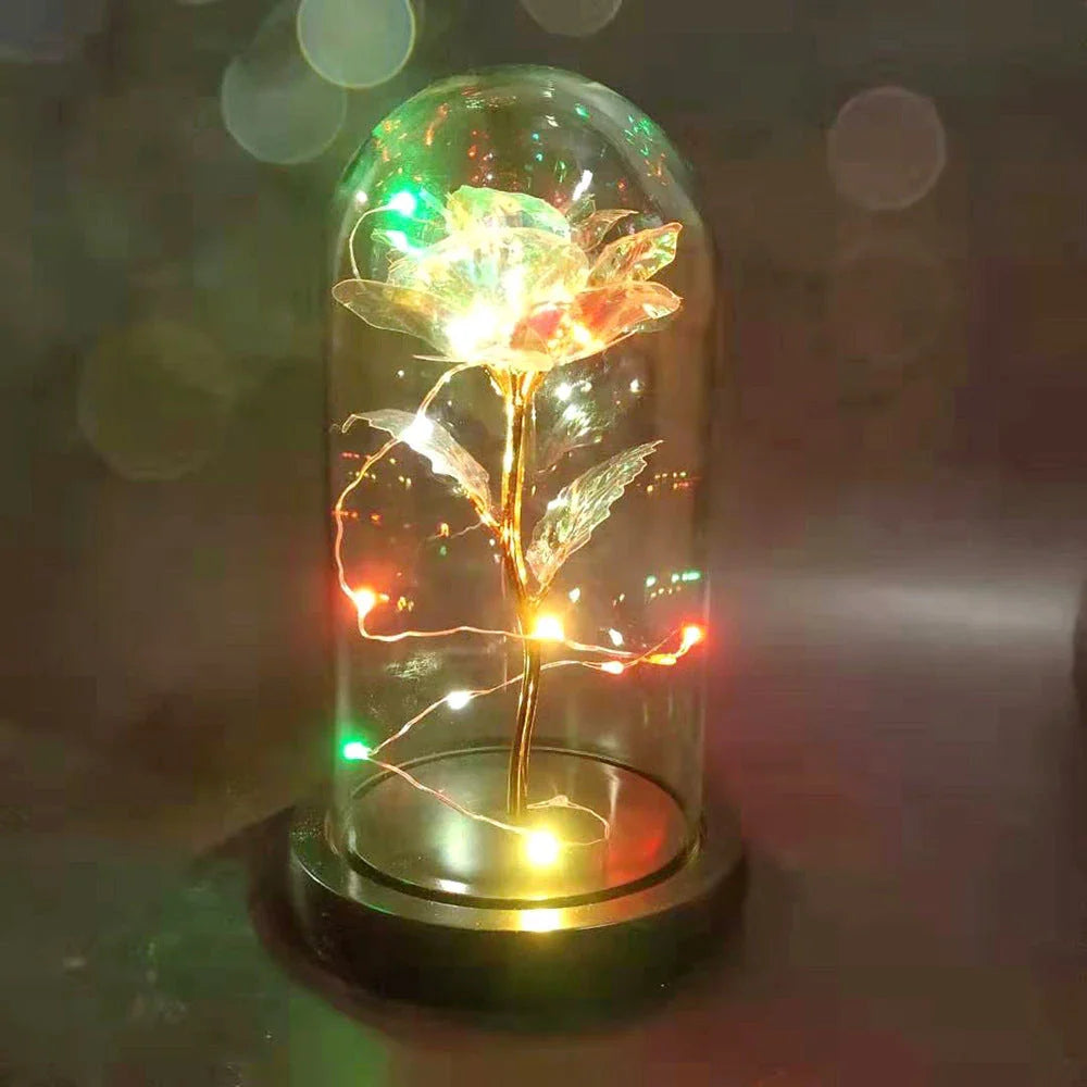 Enchanting artificial rose flower in a glass dome, a timeless home decor piece