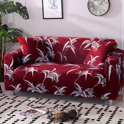 Stretchable geometric print sofa cover on a three-seater sofa