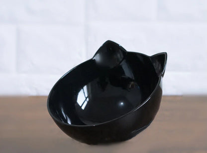 Inclined transparent cat food bowl with a gently sloped base and ergonomic design for whisker-friendly dining