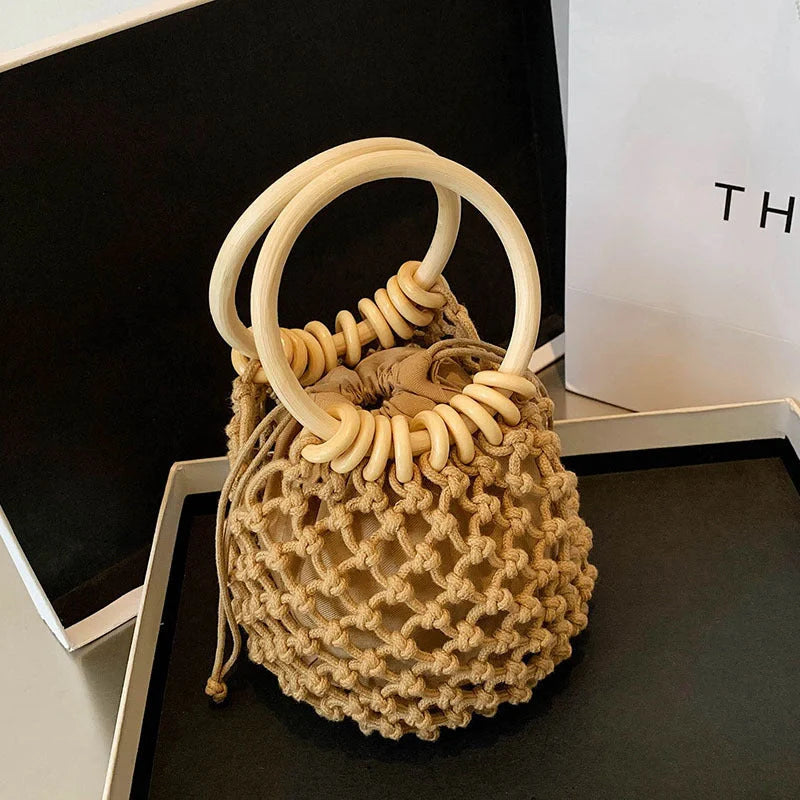 Stylish woven beach bag with wooden handle, perfect for summer outings