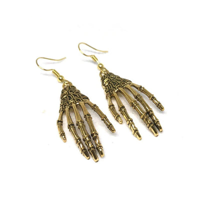 Elegant vintage carved skull and skeleton hands earrings in gold, bronze, and silver finishes