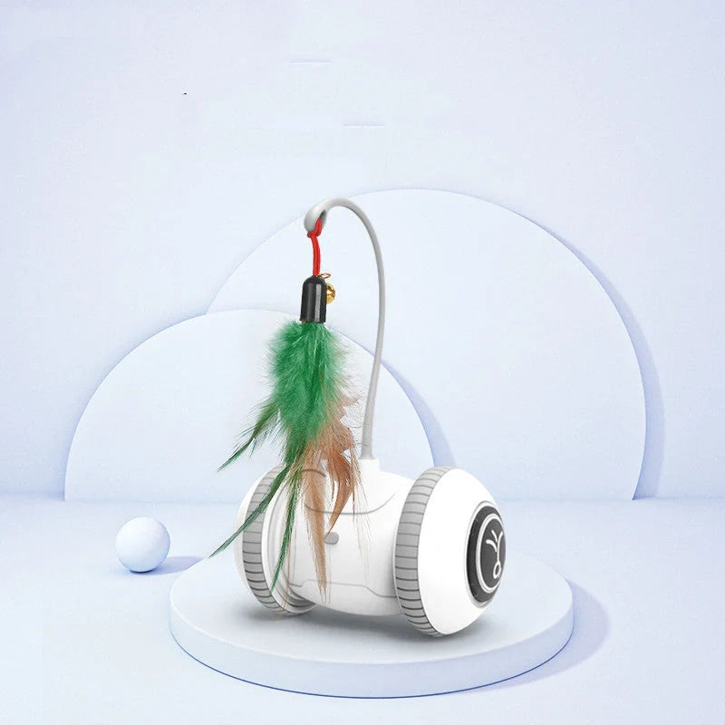 Interactive robotic cat toy with interchangeable feather and plush chick heads