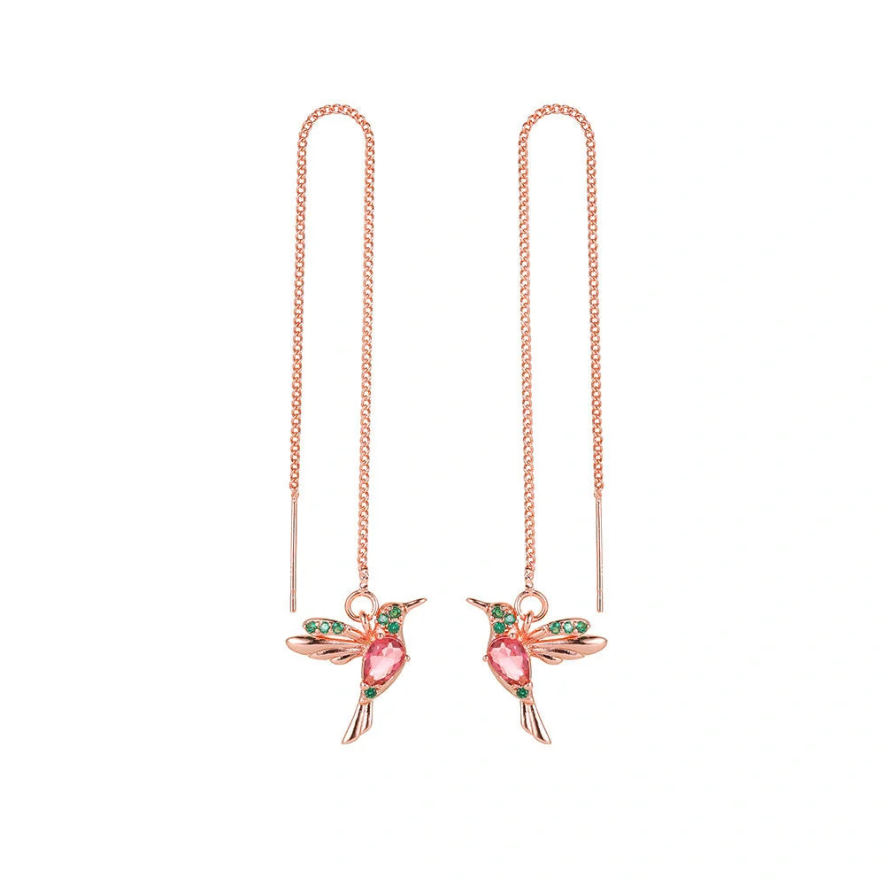 Elegant hummingbird drop earrings with crystal accents, a versatile fashion accessory for British women