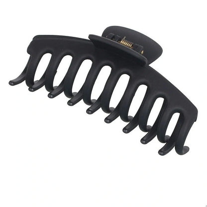 Candy-coloured plastic ponytail clip for showers and daily hair styling