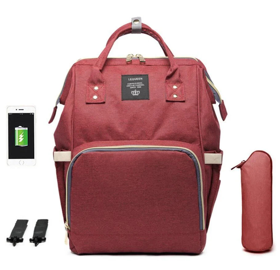 Premium mummy backpack in a range of stylish colours, featuring dedicated compartments for bottles, nappies and personal items.