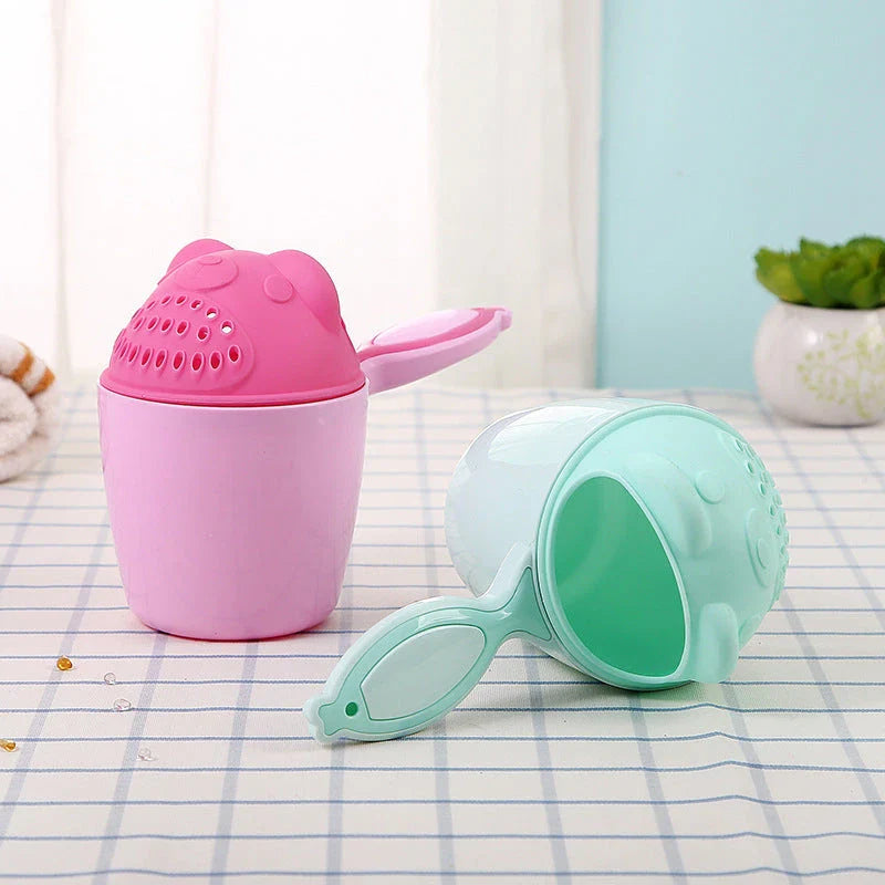 Shampoo rinse cup for baby bath time with comfortable handle and bright, colourful design