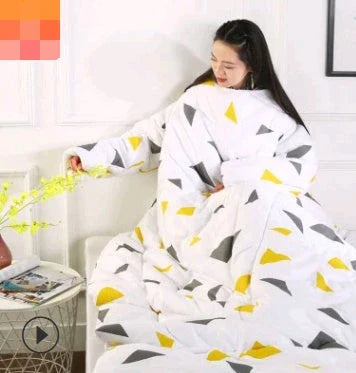 Cozy quilted lounger with sleeves in various colors and sizes, perfect for year-round indoor comfort and relaxation.