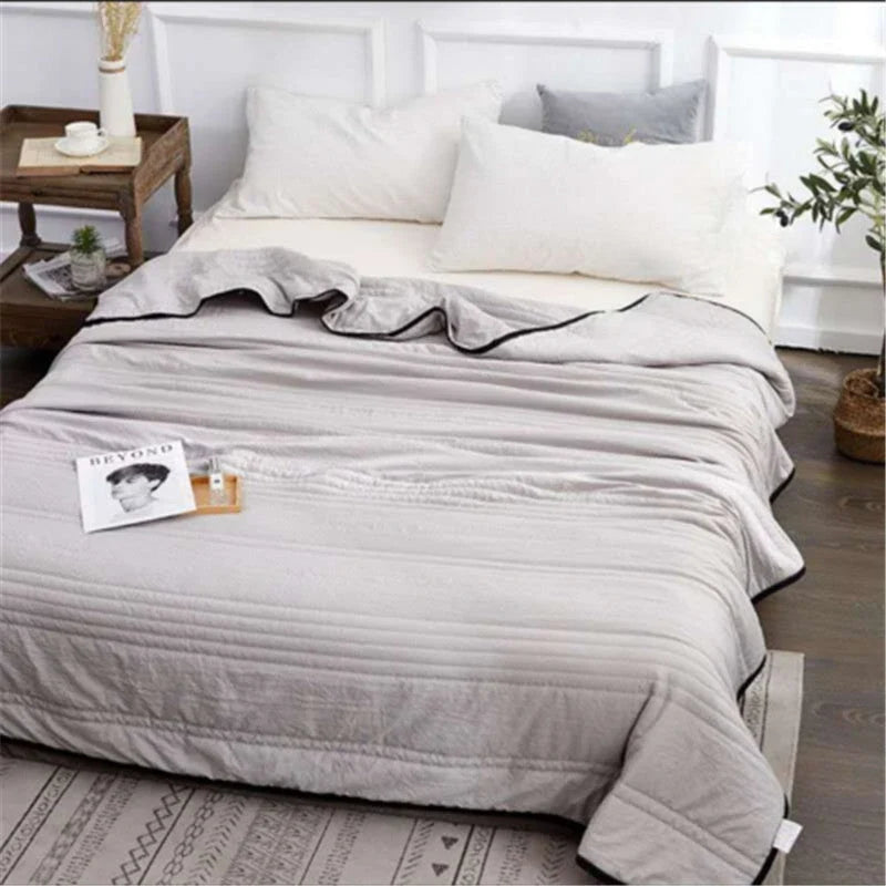 Premium cooling quilts in various colors and sizes for comfortable, temperature-regulating sleep