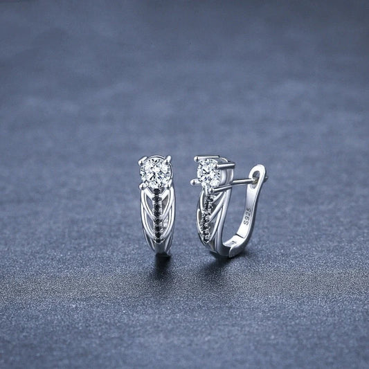 Elegant black hollow zircon copper plated earrings for women, perfect for any occasion.