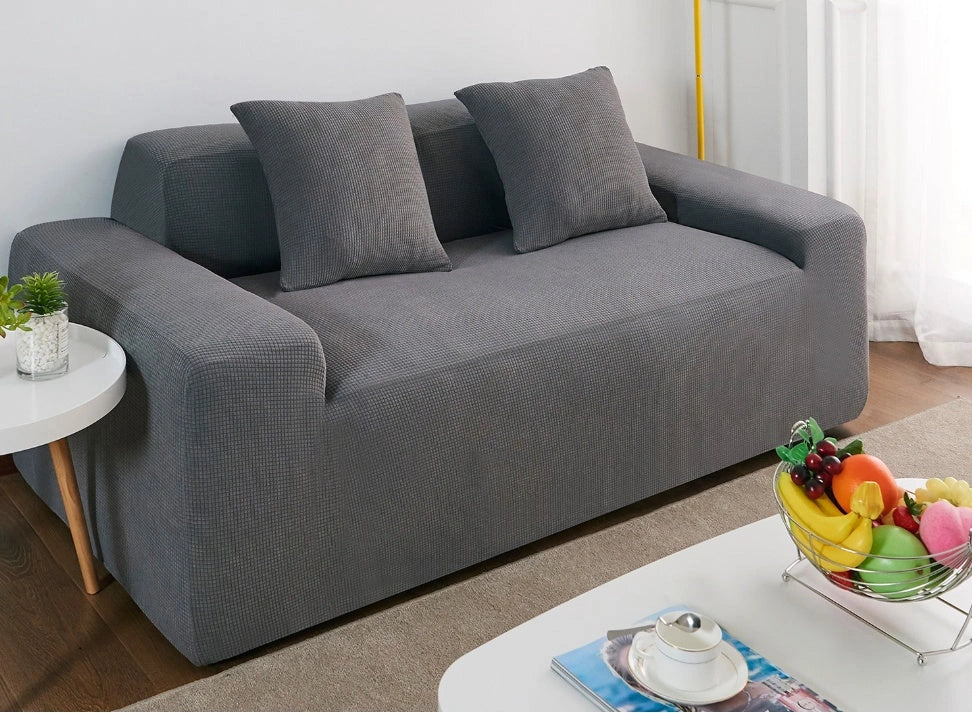 Waterproof polar fleece sofa slipcover in various colours protecting your living room furniture