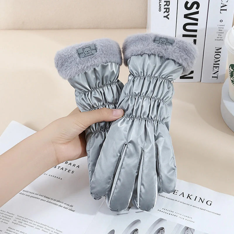 Cosy winter gloves with touch screen capability and fleece lining, available in various stylish colour options