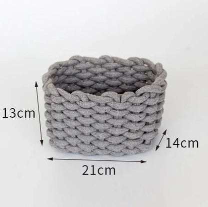 Hand-woven cotton rope storage basket in grey and white colours, featuring a minimalist nordic design for practical and stylish home organisation