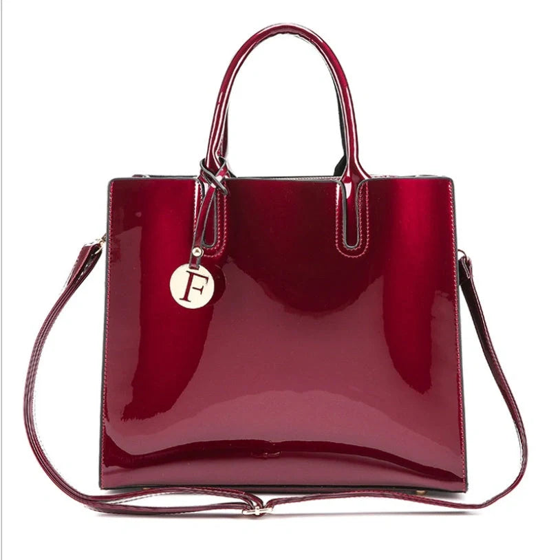 3 sets of leather handbags in various colors with zipper closure and cell phone pocket