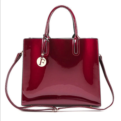 3 sets of leather handbags in various colors with zipper closure and cell phone pocket