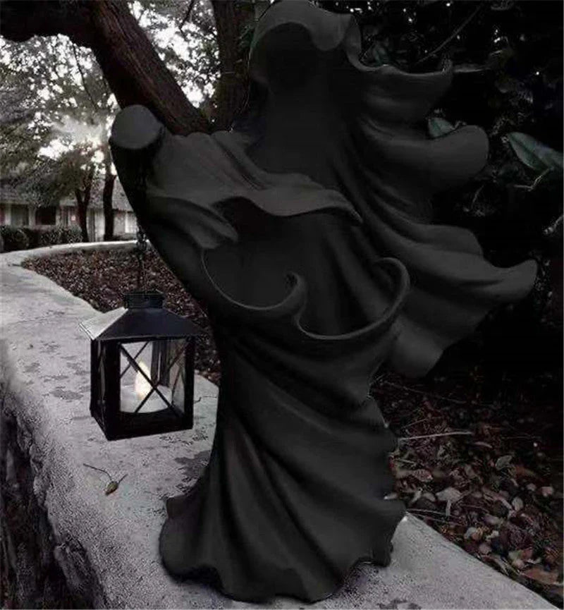 Handcrafted faceless ghost sculpture made of resin, perfect for Halloween decor and parties