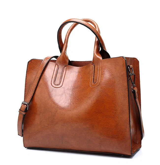Sofia Spanish Trunk Tote in various colours with multiple compartments and zipper opening