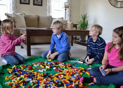 Versatile Picnic Pad made of durable nylon, featuring waterproof surface and ample storage for baby toys and essentials.