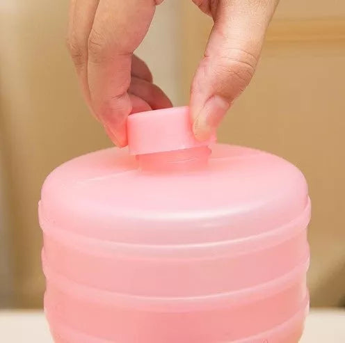 Water-filled fitness dumbbells for women in pink and green, adjustable weight