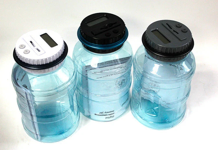 Transparent digital money box with LCD coin counter, designed for effortless coin saving and tracking in the UK