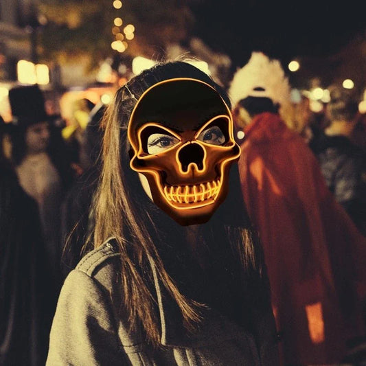 A glowing skull-shaped Halloween mask with adjustable straps and three lighting modes: constant, slow flash, and rapid pulse