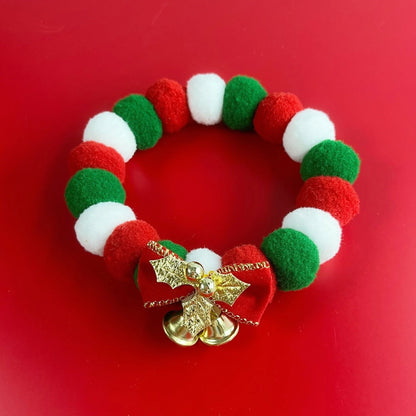 Festive plush ball pet collar with elastic fit for Christmas in green and golden leaves designs
