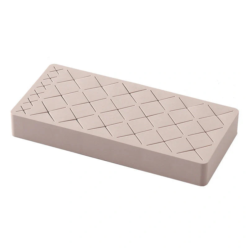 Silicone and ABS lipstick storage rack in red, pink, blue, and grey