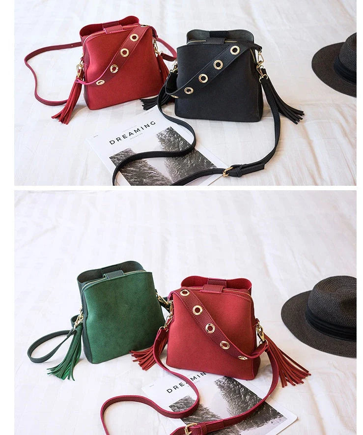 Trendy frosted tassel bucket bag in a range of classic colors, featuring a spacious interior and a dedicated camera pocket for maximum convenience.