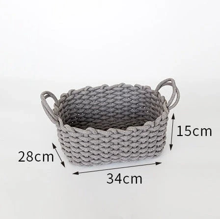 Hand-woven cotton rope storage basket in grey and white colours, featuring a minimalist nordic design for practical and stylish home organisation