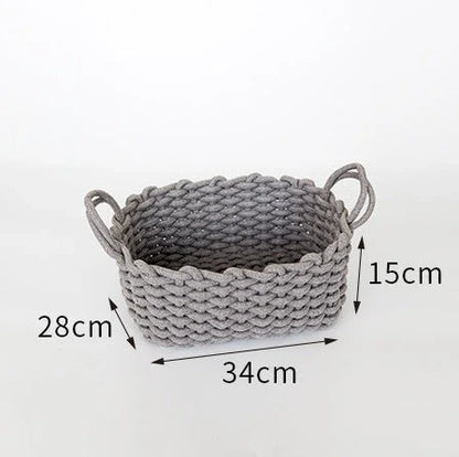 Hand-woven cotton rope storage basket in grey and white colours, featuring a minimalist nordic design for practical and stylish home organisation