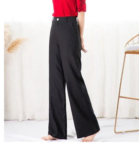 Stylish and comfortable cotton and linen trousers for British women, featuring a high-waist, straight-leg design in a range of classic colours.