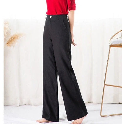 Stylish and comfortable cotton and linen trousers for British women, featuring a high-waist, straight-leg design in a range of classic colours.