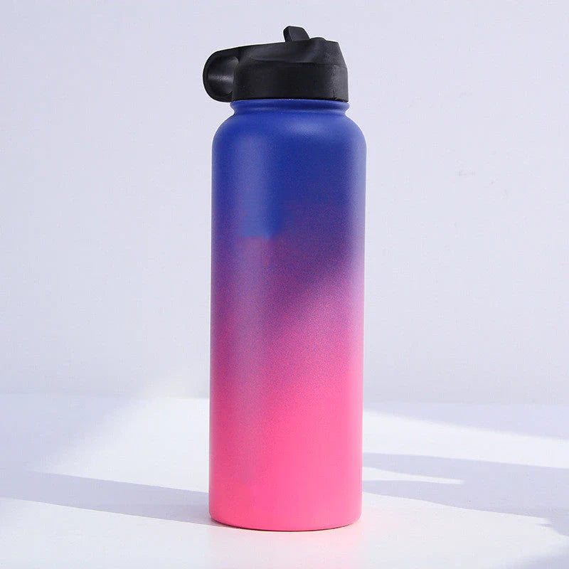 Premium stainless steel insulated tumbler with push-button lid and sleek design for outdoor adventures and active lifestyles.
